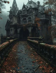 an old castle with lots of windows and towers in the foggy forest on a rainy day