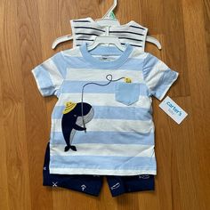 New With Tags! 3-Piece Carter’s Outfit (18-Month Boy’s). Includes Sleeveless Striped Onesie, Short-Sleeved Tee, And Coordinating Nautical Shorts. Ships From A Smoke-Free And Pet-Free Home. Cute Blue Cotton Set, Playful Blue Sets For Playwear, Blue Cotton Playtime Sets, Unisex Baby, Matching Sets, 3 Piece, Onesies, Kids Shop, Blue White