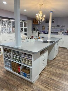 a large kitchen with lots of drawers in it