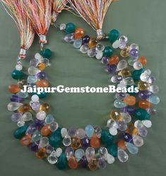 Stone Name =  Disco Gemstone  Shape = Drops Style = Gemstone Type = Natural My Main Business Motive is I Want To Give My Customer Best Quality Gemstone With Best Price I Do Not Want to Earn More Money,I Just Want Happy And Satisfied Customers. (Sizes And Measurement Are Approximations....) www.etsy.com/in-en/shop/JaipurGemstoneBeads1 Customer Satisfaction Is Our Main Priority.... Thank You For Shopping  Note :----- There Might Be Slight Change In The Color Due To Lighting So Contact Me Regarding Earn More Money, Semi Precious Stone, Stone Names, Faceted Bead, More Money, Semiprecious Stones, Customer Satisfaction, Semi Precious, Give It To Me