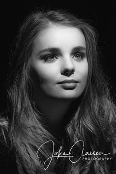 a woman with long hair and brown eyes