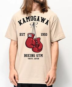 Vintage Boxing Anime Shirt: Retro Manga T-shirt, Sport 90s Anime Lovers Tee, Boxing GYM Anime Tshirt, Otaku Ropa, Graphic Anime Unisex Shirt The unisex heavy cotton tee is the basic staple of any wardrobe. It is the foundation upon which casual fashion grows. All it needs is a personalized design to elevate things to profitability. The specially spun fibers provide a smooth surface for premium printing vividity and sharpness. No side seams mean there are no itchy interruptions under the arms. Th Sporty Graphic Print T-shirt For Boxing, Crew Neck Graphic Print T-shirt For Boxing, Gym Graphic Tees, Gym Anime, Retro Manga, Vintage Boxing, Boxing Gym, Anime Tshirt, 90s Anime