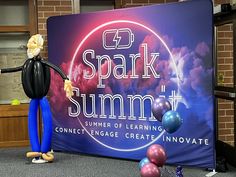 an animated man standing in front of a spark summ sign with balloons around him