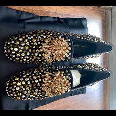 Brand New Giuseppe Zanotti Splorcia Black & Gold Low Heel Loafers (Made In Italy)- Size 39.5 - Gorgeous & Photograph Beautifully. Perfect For Any Date Night Or Special Event That Can Be Paired With Pair Of Mom Jeans, Chic Pant Suit Set, Or A Sexy Black Dress -All Gemstones Perfect & Intact- Style Includes Beautiful Tassle Embellishment. -1.5 Inch Block Heels -Purchased From Dubai Mall ( No Receipt But 100% Authentic, Includes Original Box, Dust Bags, Plastic Wrapping And Paper Placed In Shoes) Pant Suit Set, Heel Loafers, Chic Pants, Dubai Mall, Pant Suit, Suit Set, Heeled Loafers, Giuseppe Zanotti, Low Heels