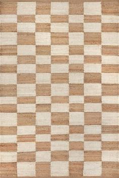 a brown and white rug with squares on the bottom, in different shades of beige