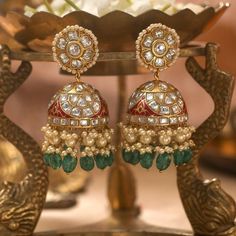 Luxury Meenakari Bridal Earrings For Celebrations, Luxury Meenakari Dangle Earrings, Luxury 22k Gold Jhumkas For Festive Occasions, Cheap Heavy Earrings For Diwali, Luxury Kundan Jhumkas With Tilla, Luxury Gold Plated Bollywood Jhumkas, Luxury Latkans Jhumkas For Women, Luxury Fusion Style Chandbalis With Meenakari, Luxury Temple Jewelry Jhumkas For Festive Season