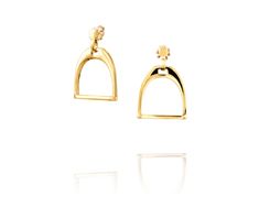 Channel your inner equestrian with the Vincent Peach Equestrian Stirrup Earrings, a captivating design that celebrates the beauty and grace of horses. These exquisite earrings, crafted from gleaming sterling silver or luxurious 14k yellow gold, feature intricately detailed stirrup silhouettes. Measuring 1.5 inches tall and 1 inch wide, these statement earrings add a touch of equestrian flair to any outfit. Unveiling Exquisite Details: Equestrian-Inspired Design: The stirrup silhouette is a timel Peach Jewelry, Diamonds And Pearls, Equestrian Jewelry, Horse World, Stirrups, Black Rhodium, Equestrian Style, Jewelry Creation, Casual Elegance