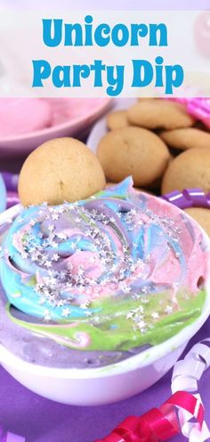 the unicorn party dip is ready to be eaten with rainbow sprinkles and cookies