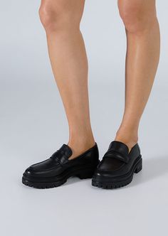 Stand-out from the crowd with our Wiz loafer. Showcasing a classic black leather exterior, this design features an exaggerated chunky sole with a sleek rounded toe-shape, a high-cut vamp and is finished with a leather upper, lining and cushioned foot-bed. -Material: Leather Upper & Lining -Sole: Man-Made -Fit: We recommend choosing a half size down -Toe-shape: Rounded -Features: Chunky sole -Heel: 4.5cm Modern Black Platform Loafers With Lug Sole, Modern Black Platform Loafers With Chunky Platform, Modern Black Platform Loafers With Chunky Sole, Black Platform Loafers With Chunky Platform For Work, Black Chunky Platform Loafers For Work, Black Leather Platform Loafers With Chunky Platform, Black Leather Platform Loafers With Lug Sole, Black Leather Loafers With Chunky Platform, Black Platform Loafers With Lug Sole For Business