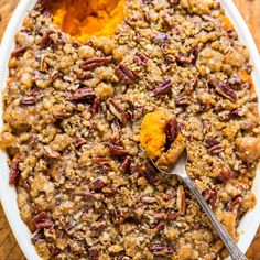 a serving dish filled with sweet potato casserole