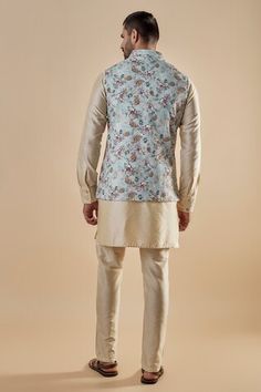 Light blue cotton silk bundi jacket with floral print. Comes with beige pant and a kurta. - Aza Fashions Spring Designer Cotton Silk Nehru Jacket, Unstitched Cotton Nehru Jacket For Spring, Fitted Cotton Silk Nehru Jacket For Spring, Fitted Nehru Jacket In Cotton Silk For Spring, Fitted Cotton Nehru Jacket For Spring, Boys Kurta, Beige Pants, Nehru Jackets, Kurta Set