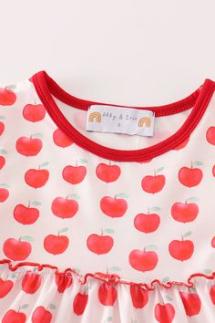 Get ready to be the apple of everyone's eye with our Red Apple Print Tiered Dress. This playful and quirky dress features a charming print of red apples and a tiered design that adds unique flair. Perfect for any occasion, this dress will make you stand out in a fun and stylish way. (So don't be a bad apple, add this dress to your wardrobe today!) 50%Cotton 50%Spandex MC403084 Quirky Dress, Sequin Crafts, Apple Print, Plaid And Leopard, Bad Apple, Apple Prints, Loungewear Sets, Sequins Embroidery, Swiss Dot