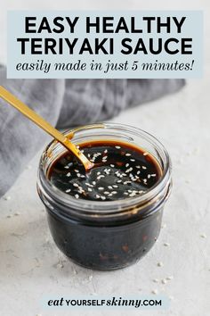 a jar filled with homemade teriya sauce on top of a white tablecloth and text overlay reads easy healthy teriyaki sauce easily made in just 5 minutes