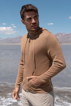 Introducing our Lightweight Full-Zip Baby Alpaca Hoodie. Crafted from the finest baby alpaca wool, renowned for its luxurious softness and sustainability, this hoodie promises an unparalleled blend of warmth, comfort, and durability. It is designed for versatility and year-round wear and comes in timeless colors to suit your style. A must-have for the modern man! Packable for on-the-go wear. Both warm and lightweight. Wrinkle-free design. Breathable and adaptable to any climate. Full-Zip Hoodie