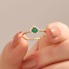 A symbol of beauty: The vibrant emerald flower design showcases the beauty of nature and adds a pop of color to your ensemble, making a bold fashion statement.Perfect gift choice: Whether for a birthday, anniversary or just to show someone you care, this handmade emerald flower ring is a thoughtful and unforgettable gift option. Ring Details ❥ Gold KT: 14k 10k 18k Solid Gold ❥ Gold Color Options: Yellow Gold, White Gold, Rose Gold ❥ Band Width: 1.45 mm ❥ Top Width: 8.00x8.00 mm ❥ Thickness: 1.40 Elegant May Birthstone Flower Ring With Gemstone, Fine Jewelry Round Flower Ring With May Birthstone, Fine Jewelry Flower Ring With May Birthstone Gemstone, Fine Jewelry May Birthstone Flower Ring, Elegant Flower Ring As Promise Ring With May Birthstone, Fine Jewelry Flower Ring With May Birthstone, Emerald Flower Ring Gift In Green, Green May Birthstone Flower Ring In Fine Jewelry, Emerald Ring With Halo Design As A Gift