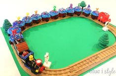 a toy train set with blue and red decorations