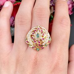 Featuring a jadau ring made in 22ct gold and embellished with rubies, emeralds and pearls. The ring weighs 4.6 GMs Price Breakup Summary Component Rupees % of Total 22k Gold 21,912 72.8% Stones & Beads 2,376 7.9% Making Charges 3,944 13.1% Taxes (GST) 847 3.0% Total 30,079 100.0% View Detailed Price Breakup Watch Video Here Traditional Yellow Gold Ruby Ring For Wedding, Traditional Yellow Gold Ruby Wedding Ring, Traditional 22k Gold Ruby Ring, Traditional 22k Gold Ruby Ring For Wedding, Traditional Yellow Gold Ruby Ring With Gemstone, Traditional Hallmarked Ruby Ring For Ceremonies, Traditional Yellow Gold Emerald Ring Gift, Traditional Yellow Gold Ruby Ring, Traditional Gold Emerald Anniversary Ring