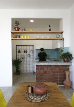 the kitchen is clean and ready to be used as a dining room or living room