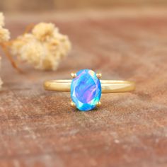 Blue fire Ethiopian opal ring for women, minimalist ring, October birthstone, AAA Ethiopian opal ring, 925 Sterling silver ring, Gold ring, gift for her. *Other Similar Jewelry Available Here* https://www.etsy.com/shop/AreebaJewelry Details:- Gemstone - Ethiopian opal  Stone Color - Natural  Stone Setting - Prong Quality - AAA Grade Rize Size - 4 US TO 9 US Available Type - 100% Natural  Shipping service - Free worldwide shipping service About AreebaJewelry:- AreebaJewelry takes great pride in t Minimalist Opal Birthstone Ring, Solitaire Opal Ring In Round Shape, Round Solitaire Opal Ring, Solitaire Opal Ring With Round Shape, Minimalist Silver Opal Ring, Round Opal Solitaire Jewelry, Round Solitaire Opal Jewelry, Minimalist Opal Rings With Birthstone, Minimalist Opal Ring With Birthstone