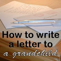 an open book with a pen on top of it and the words how to write a letter to a grandchild