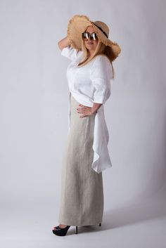 Linen Wide Legs Pants for Summer. Pants with zipper on the back side. Made of 100% linen The model wears size M - 5′6″ / 170 cm. The model can be customised by size given from the client. Wide Leg Flax Bottoms For Spring, Chic Full Length Linen Pants, Beach Linen Pants In Flax Color, White Linen Full-length Bottoms, High-waisted Linen Bottoms In Flax, High-waisted Linen Bottoms In Flax Color, Elegant Beach Bottoms With Pockets, Linen Full-length Pants For Spring, Fitted Linen Straight Pants