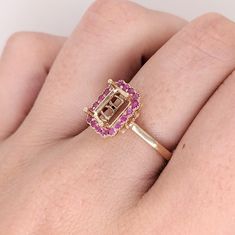 Discover a timeless classic with our Pink Sapphire Ring Semi Mount in Solid 14k Gold! This elegant emerald cut gemstone will make a stunning statement piece that will last for generations. With meticulous milgrain detail, this exquisite ring is the perfect way to show your love forever. Sapphire Halo Ring, Designer Silver Jewellery, Pink Sapphire Ring, Jewelry Showcases, Rose Gold Pink, Love Forever, Halo Ring, Earring Findings, Pendant Bracelet