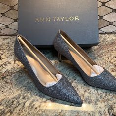 Color: Silver Style # 827535 A Pointy Toe Adds Undeniable Sophistication To These Straight Heel Pumps - A Luxe Glittery Finish. Pointy Toe. Padded Footbed For Complete Comfort. 3" Heel. 50% Polyurethane, 30% Polyethylene Terephthalate, 20% Polyester Pristine Condition - Never Worn Imported Sparkling Pointed Toe Heels For Fall, Sparkling Heels For Formal Fall Events, Elegant Glitter Heels For Fall, Silver Pointed Toe Heels Medium Width, Silver Kitten Heels For Party, 4-inch Heel, Elegant Silver Slingback Pumps With 4-inch Heel, Glamorous Silver Slingback Pumps With 4-inch Heel, Metallic Silver Pointed Toe Heels With 4-inch Heel, Polyethylene Terephthalate