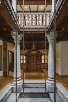 the inside of a building with columns and pillars