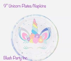 the unicorn plates / napkins are pink, blue, and yellow