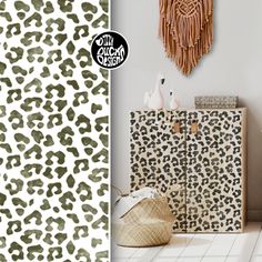 an animal print is on the wall next to a leopard print cabinet and other items