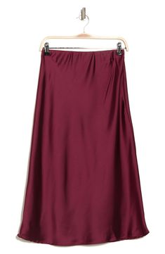 Elevate your wardrobe with this pull-on bias satin midi skirt for elegant, feminine style. 31" length (size S) Elasticized waist Pull-on style Satin construction 97% polyester, 3% spandex Machine wash cold, line dry Made in USA Model’s stats for sizing: 5’10” height, 34” bust, 27” waist, 35” hips. Model is wearing size S. Solid Satin Skirt For Workwear, Satin Lined Workwear Maxi Skirt, Satin Lined Maxi Skirt For Work, Relaxed Satin Pencil Midi Skirt, Relaxed Fit Satin Midi Pencil Skirt, Wine Red Skirt, Red Satin Skirt, Burgundy Midi Skirt, Elegant Feminine Style