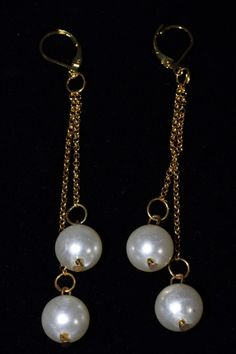 Beautiful and graceful faux pearl earrings in your choice of matte gold tone or silver tone. Great for parties, bridesmaids or holiday gifts. ^Length: 3.25 inches Full drop: 3.50 inches Evening Pearl Drop Dangle Clip-on Earrings, Elegant Matte Gold Earrings For Party, Elegant Matte Gold Party Earrings, Hypoallergenic Pearl Jewelry For Parties, Gold Linear Earrings With Pearl Drop For Party, Gold Linear Pearl Drop Earrings For Party, Elegant Matte Gold Earrings For Formal Occasions, Party Pearl Charm Earrings, Formal Pearl Drop Metal Earrings