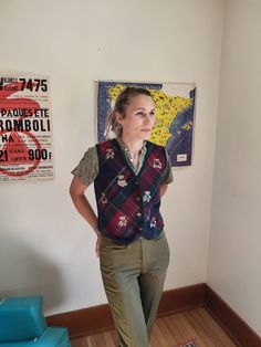 Up for sale is a vintage 1990's Blauenbock wool button front vest made in Italy, size XS to S. Overall the garment is beautiful and features no major rips, tears, or stains. There may be some pilling to the fabric or minor distress, but nothing major was noted. Blauenbock 100% Wool Made in Italy Estimated size: XS to S Model is 5'5 125 lbs and wears a small Measured flat: 18 inches pit to pit 14 ½ inches shoulder to shoulder 17 inches long Vintage Cotton Vest With Button Closure, Vintage Sweater Vest For Fall Workwear, Vintage Wool Sleeveless Sweater Vest, Vintage Sleeveless Wool Sweater Vest, Vintage Wool Vest For Fall, Casual Wool Vest With Buttons, Vintage Sleeveless Vest With Button Closure, Vintage Workwear Vest With Buttons, Vintage Winter Vest With Button Closure