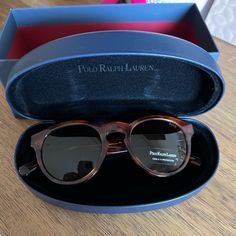 Brand New Polo Ralph Lauren Unisex Sunglasses! Tortoiseshell Color And A Rounded Frame. 100% Uv Protection. Comes With The Case, Cleaning Cloth, And Box. Never Worn! Ralph Lauren Sunglasses, Lauren Brown, Unisex Sunglasses, Sunglasses Branding, Cleaning Cloth, Uv Protection, Sunglasses Accessories, Polo Ralph, Polo Ralph Lauren