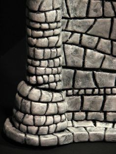 an artistic photo of a stone structure made out of bricks