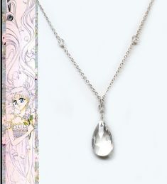 "This crystal necklace is inspired by manga artbook version of the ball gown sailor scouts.  This sophisticated Swarovski crystal necklace can be used as an elegant cosplay item, formal wear or casual everyday wear.  It is also perfect for a themed wedding!  The necklace is perfect for Sailor Moon cosplayer or Sailor Moon enthusiast. It is composed:  - Tear shaped clear Swarovski Crystal 22x12mm - 5 faceted 4mm clear glass crystals and an additional crystal on the extension chain - High quality Moon Ball Gown, Sailor Moon Jewelry, Sailor Moon Collectibles, Formal Necklace, Clear Crystal Necklace, Cosplay Jewelry, Formal Jewelry, Crystals Jewelry, Necklace Swarovski