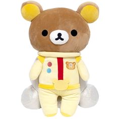 a brown teddy bear wearing a yellow outfit