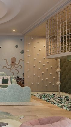 a living room with an octopus theme on the wall