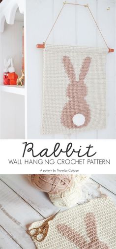 a crocheted bunny is hanging on the wall