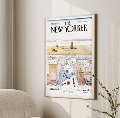 the new yorker magazine cover is displayed on a wall next to a white chair