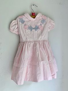 "This vintage dress by Cinderella is exquisite is so fun!  Pink high quality fabric with grey and pink appliqué flowers.  This is about a size 3 or 4.  13\" flat across chest and 11\" flat across waist. Belt can cinch in waist. 19\" in total length. Very good  condition. Made in USA. 100% cotton.  Skirt has a bit of netting underneath to pouf it out a bit." Pink And Grey Dress, Appliqué Flowers, Pink And Gray, Cotton Skirt, Inner Child, Vintage Dress, Gray Dress, Waist Belt, Vintage Pink