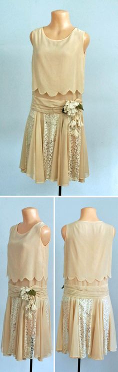 1920's silk chiffon and lace dress. Bound round neckline and sleeveless bodice. Second layer of chiffon with scalloped edges that hang to waist. Pleated 3" dropped waistband has cloth flower decoration. Gored skirt has 6 panels of beige lace in addition to chiffon panels, making it very full at bottom only. Skirt lined with silk. 1930 Fashion, Chiffon Lace Dress, Gored Skirt, Flapper Style, 1920s Dress