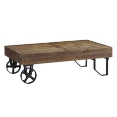 a wooden table with wheels on it