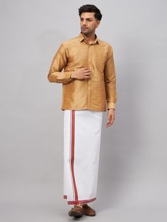 VM By VASTRAMAY Men's Rose Gold & White Silk Blend Shirt And Mundu Set A stylish fusion of tradition and modernity, this set exudes elegance and sophistication. Crafted from a luxurious silk blend, it offers comfort and style in equal measure. Features Black and white color combination Silk blend fabric for a luxurious feel Traditional mundu paired with a modern shirt Perfect for formal occasions Specifications Material: Silk blend Color: Black and white Size Options: S, M, L, XL Care: Dry clean Classic Long Sleeve Semi-formal Sets, Classic Long Sleeve Festive Traditional Wear, Elegant Semi-formal Festive Shirt, Traditional Festive Shirt For Formal Occasions, Festive Fitted Shirt For Semi-formal Occasions, Festive Fitted Semi-formal Shirt, Traditional Long Sleeve Semi-formal Sets, Festive Semi-formal Long Sleeve Shirt, Classic Long Sleeve Sets For Eid