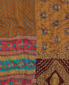 an assortment of different colors and patterns on fabric, including one in brown, the other in yellow