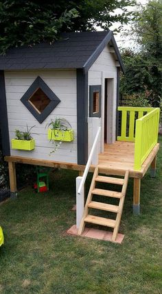 a dog house with stairs leading up to it