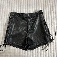 - Size Small - Color Black - Leather Type Material - Laces On Both Sides For Any Other Questions Feel Free To Ask Me And I’m Always Open To Offers! Edgy Leather Shorts, Edgy Black Leather Shorts, Luxury High-waisted Leather Shorts, Nike Sweat Shorts, Cotton Shorts Women, Black Leather Bottoms With Built-in Shorts, High-waisted Faux Leather Shorts With Built-in Shorts, Chino Shorts Women, Black Leather Shorts