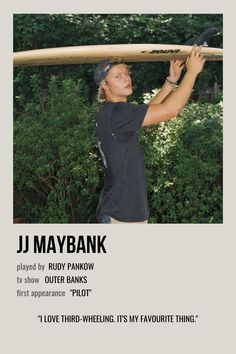 a man holding a surfboard over his head with the caption j maybank