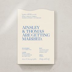 the front and back cover of an elegant wedding card, with blue ink on white paper