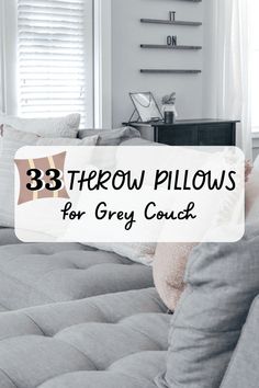 a couch with pillows on it and the words 33 throw pillows for grey couch